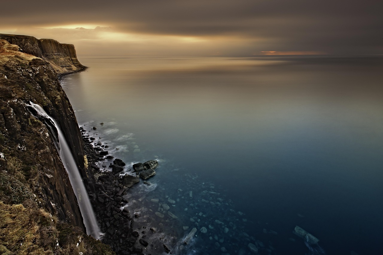 UK location photograph featuring cliff, waterfall, scotland